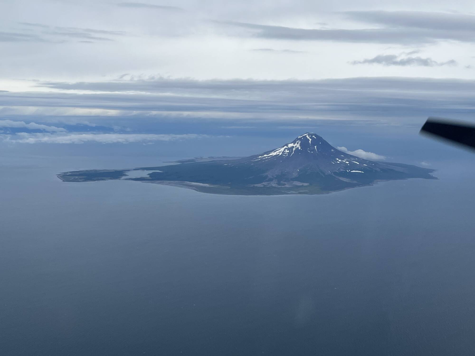 Augustine Volcano seen from the air during an Alaska volcano and glacier safari Augustine Volcano seen from the air during an Alaska volcano and glacier safari