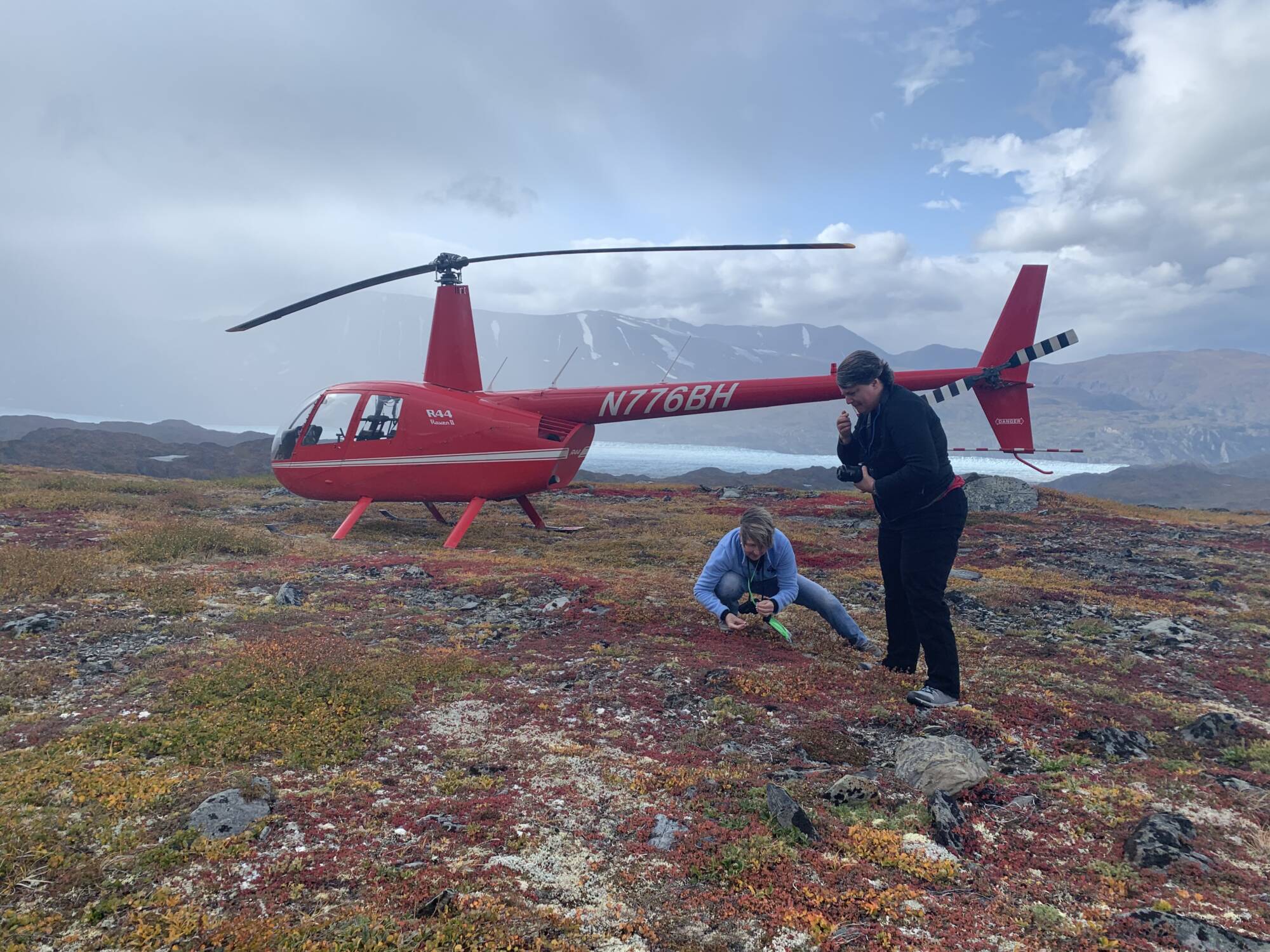 Private Alaska wildlife safari helicopter landing in remote wilderness