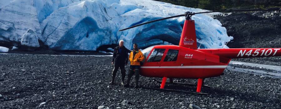 Helicopter on a remote Alaska glacier landing during a Homer flightseeing tour